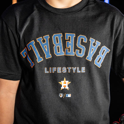 Youth model wearing black youth graphic tee with "Houston Astros Upside Down" design
