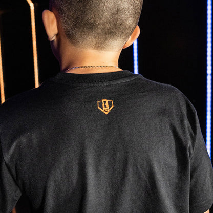 Youth model wearing black youth graphic tee with "Houston Astros Upside Down" design