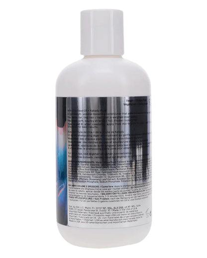 Back of IGK Extra Love Volume thickening conditioner bottle with product details