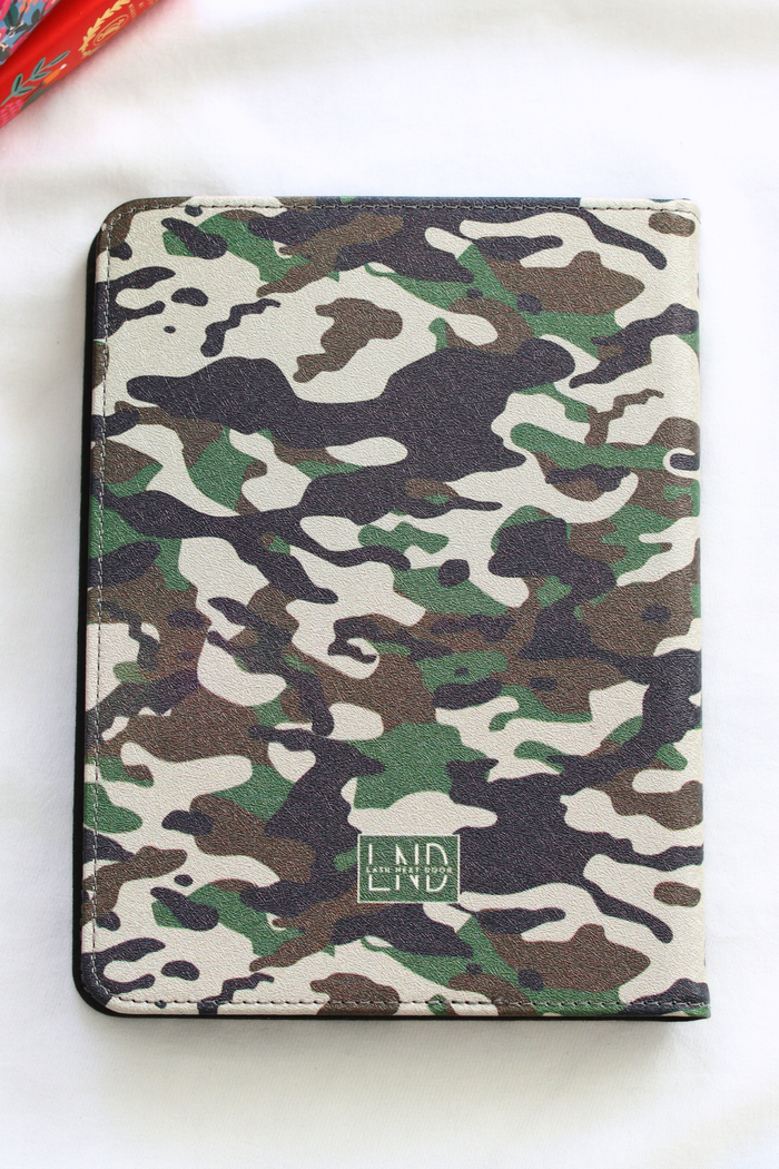 Camouflage-patterned kindle case on a white background