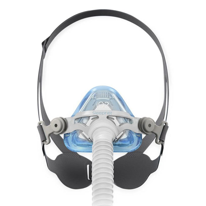CPAP mask with hose on a white background