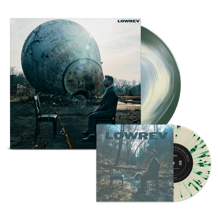 A Lowrev album vinyl cover features a man in a suit facing an empty chair by a weathered sphere in an industrial space, with another preorder vinyl for "It’s Hard to Lie to Strangers" by Lowrev displayed in the foreground.