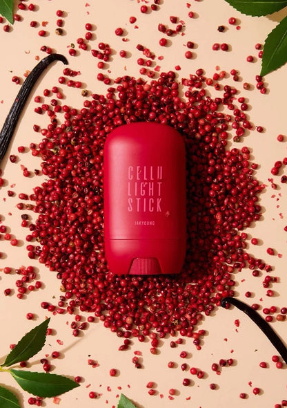 Red stick with 'Gellu' branding surrounded by red berries on a beige background