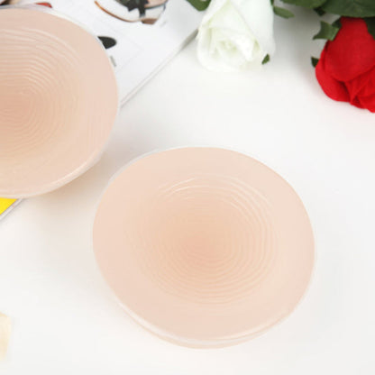 InTheMask by MOLIS silicone breast forms with round shape, cleavage pockets, compatible with A-Z cups, designed for zentai and 3D breast effect.