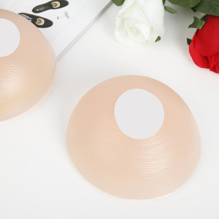 InTheMask by MOLIS silicone breast forms with round shape, A-Z cups, cleavage pockets, and realistic 3D breast appearance.