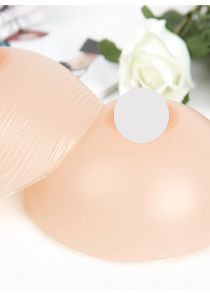 InTheMask by MOLIS silicone breast forms with round shape, cleavage pockets, compatible with A-Z cups, for zentai and 3D breast enhancement.