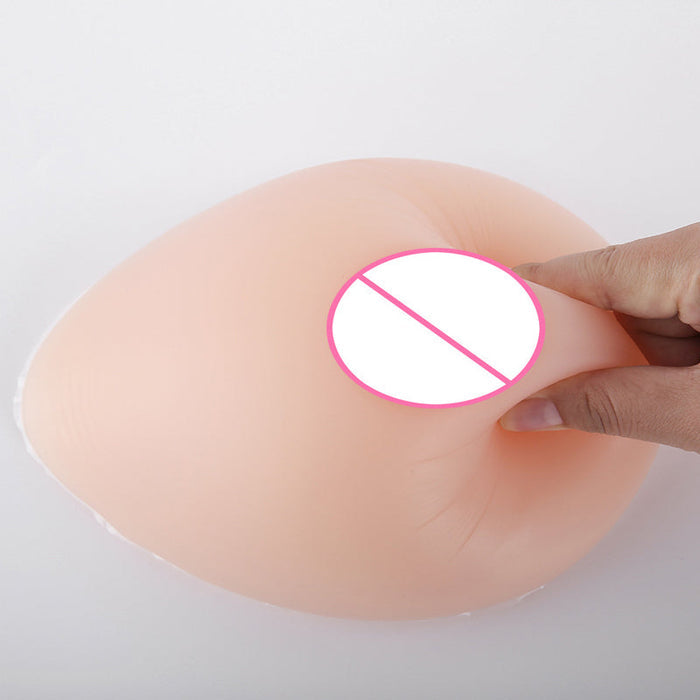 Inthemask by Moli's teardrop silicone breast forms with cleavage pockets, compatible with A-Z cups for cosplay or costume use.