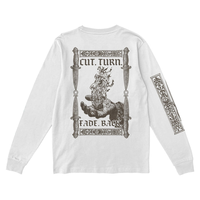 Hail The Sun white long-sleeve shirt with a bold back graphic: hands holding a flaming knife, ornate borders, swords, “CUT. TURN. FADE. BACK.” text. Matching artwork also decorates the right sleeve.
