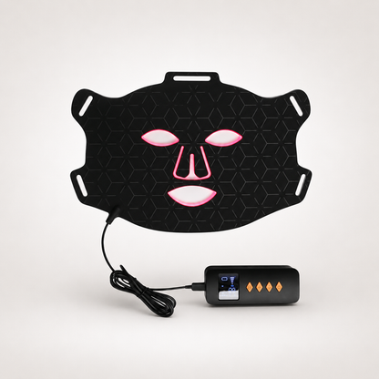 Professional LED red light therapy face mask with handheld controller on light background