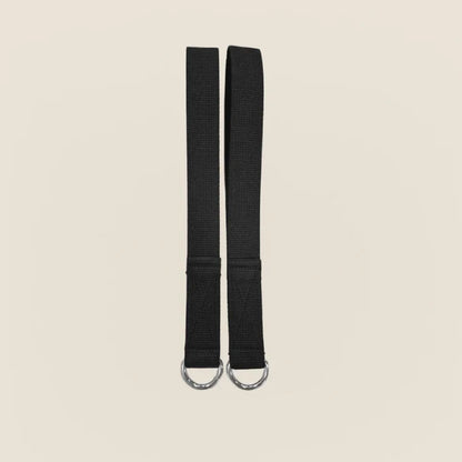 Pair of black webbing Pilates straps with 9-inch loops and silver D-rings.