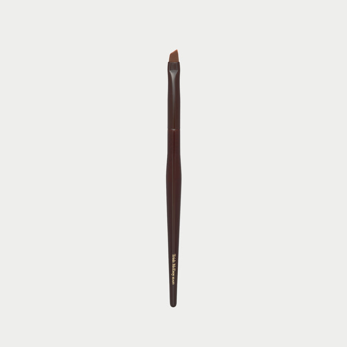 Makeup brush 50 with brown handle and black bristles on a white background