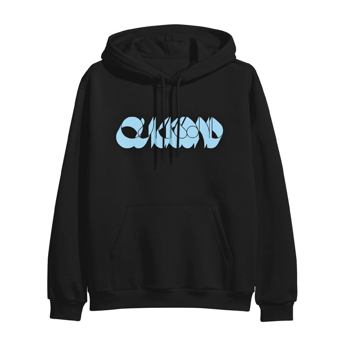 A black Quicksand hooded sweatshirt featuring a large front pocket and a light blue abstract print across the chest.