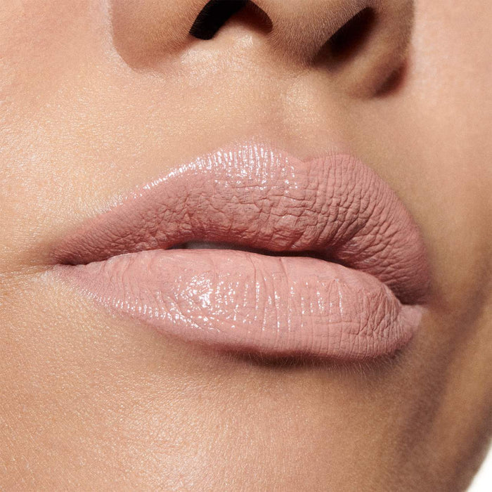 Close-up of MAC Cosmetics MACximal Sleek Satin Hydrating Lipstick in various shades, showcasing smooth, glossy lipstick textures.