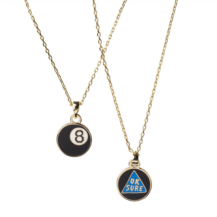 Yellow Owl Workshop Magic 8-Ball double-sided pendant necklace with black and white design, hanging on a chain.