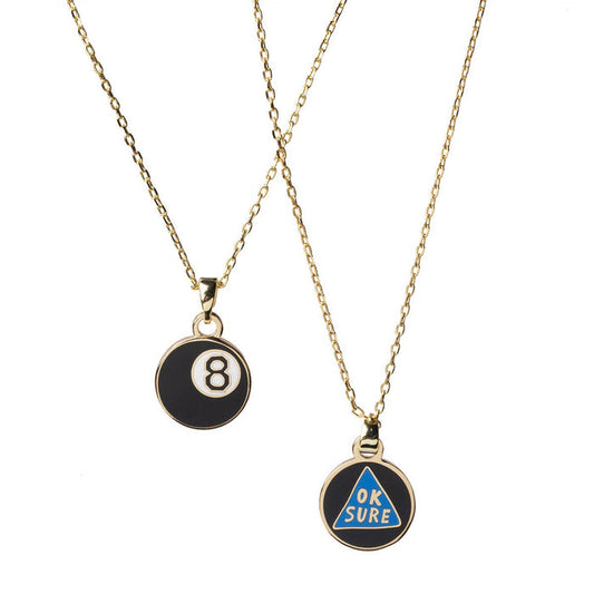 Yellow Owl Workshop Magic 8-Ball double-sided pendant necklace with black and white design, hanging on a chain.