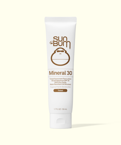 Sun Bum Mineral 30 sunscreen lotion tube on a beige background