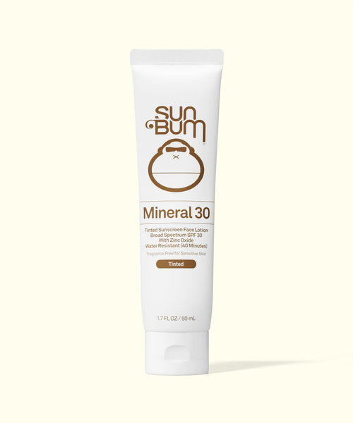 Sun Bum Mineral 30 sunscreen lotion tube on a beige background