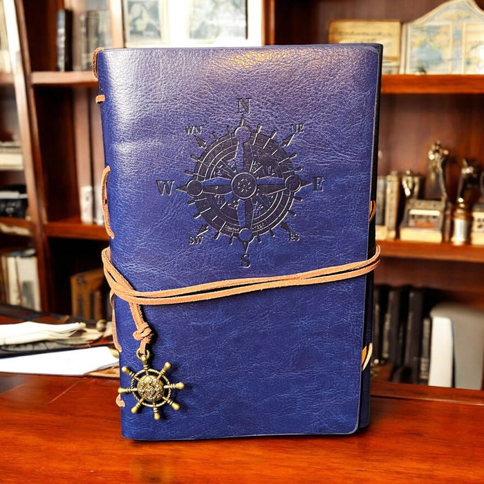 blue journal with nautical compass detail