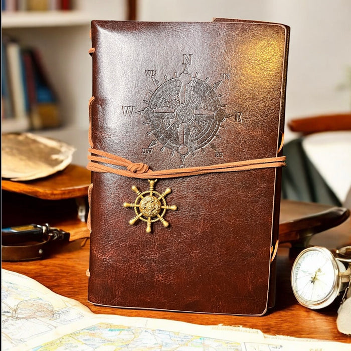 brown journal with nautical compass detail