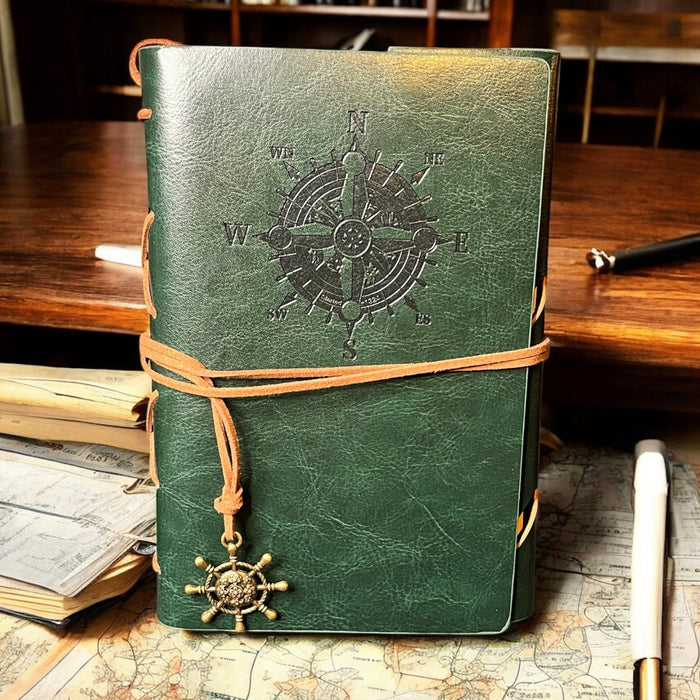 dark green journal with nautical compass detail