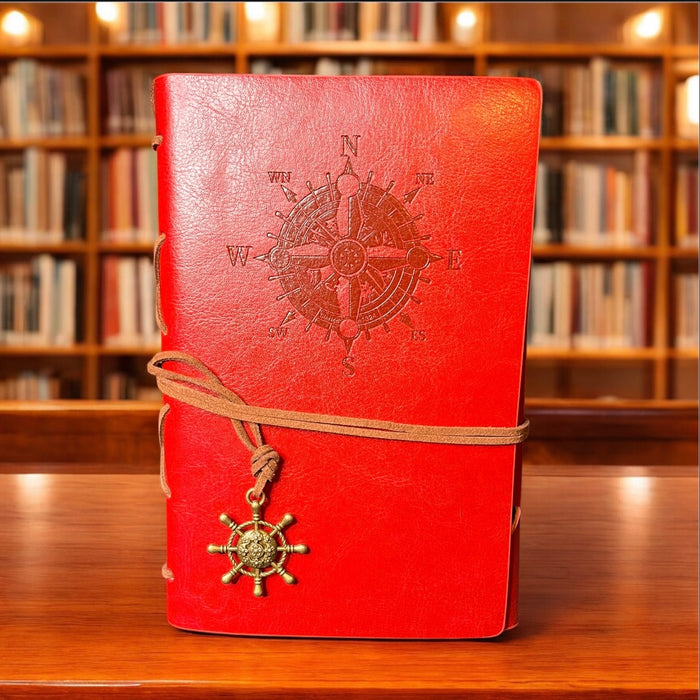 red journal with nautical compass detail