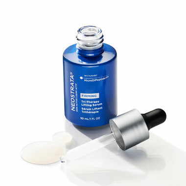 Neostrata Tri-Therapy Lifting Serum 30ml bottle, clear beauty serum with pump dispenser, for skin firming and anti-aging.