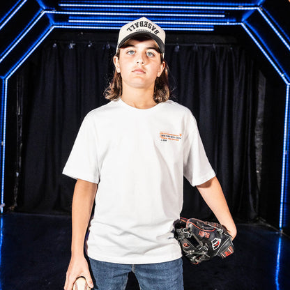 Youth model wearing white youth graphic tee with "New York Mets Drip" design