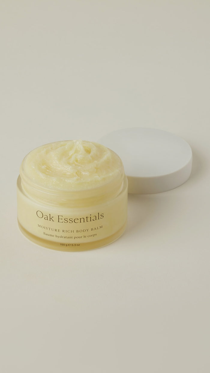Oak Essentials Moisture Rich Body Balm in 150g jar, creamy texture, natural skincare product for nourishing and hydrating skin.
