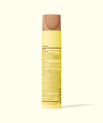 Back view of Sun Bum Original SPF 45 Sunscreen Face Mist bottle with detailed product information label.