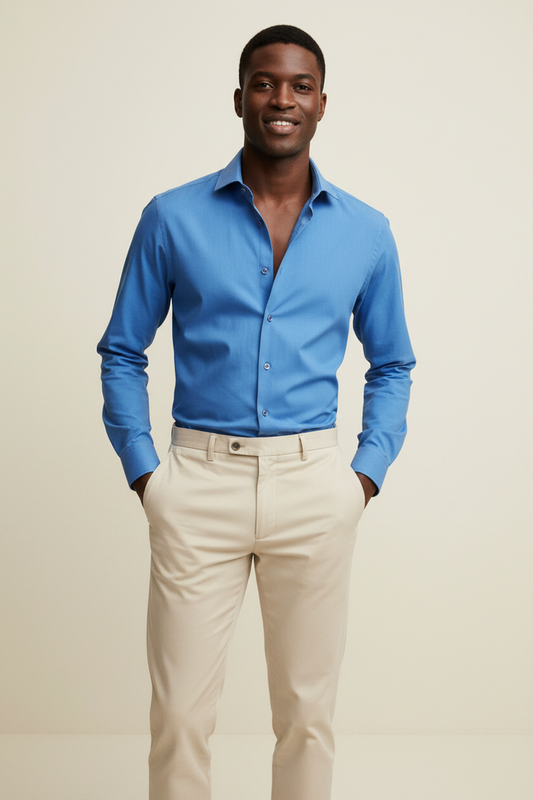 Full length model wearing Verso Blue Dress Shirt and Khaki Beige Pants on cream background