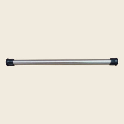 Gratz weighted stainless steel Pilates pole with black rubber end caps on beige background.