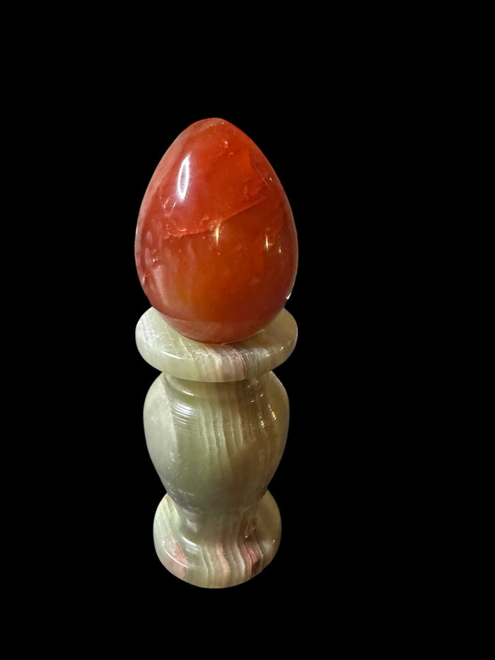 Shop high-quality Carnelian crystal eggs sold by weight. Ideal for sacral chakra healing, energy boosting, rituals & spiritual home decor. Raven’s Cauldron.