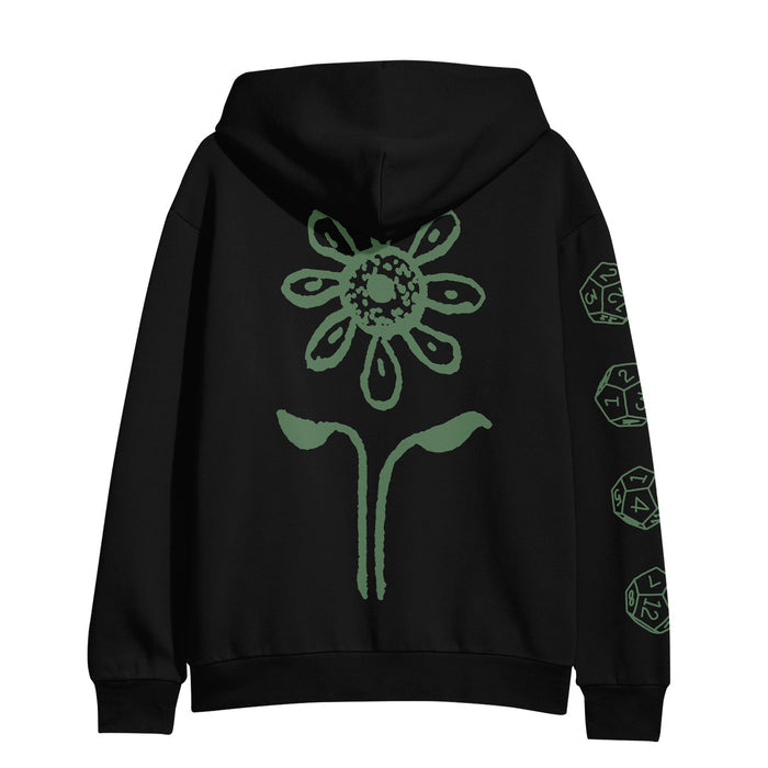 The Resilia black hoodie showcases a bold green flower and leaf design on the back, with black dice and polyhedral geometric shapes decorating the right sleeve.