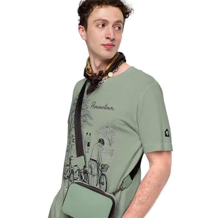 erson wearing Adam's Nest x Nathan Rapport Provincetown Boy Beach Bikes sage t-shirt with crossbody bag, LGBTQ+ queer artist apparel from Provincetown MA