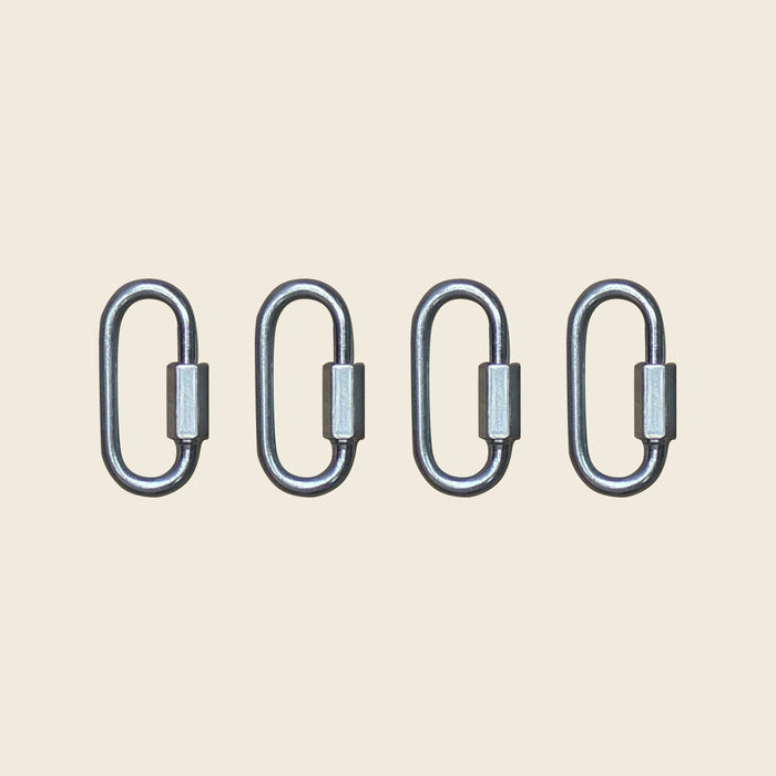 Set of four Gratz metal Pilates quick link connectors with screw-lock closures.