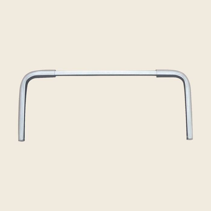 Aluminum replacement foot bar support for a Gratz Pilates Reformer on a beige background.