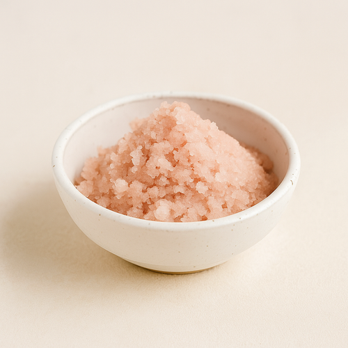 white bowl filled with a himalayan salt scrub
