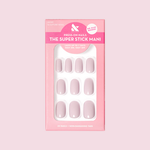 Pack of Sculpture Wing | Short | Round - Tab Press-On nails in cool lavender neutral shade with easy peel tabs on pink box background