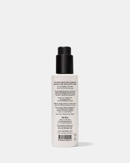 SEEN Leave-In Conditioner 5oz bottle with a sleek design, featuring the product label and a hint of scented floral elements.