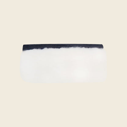 Genuine white shearling sheepskin cover for reformer handles, a soft-grip Pilates accessory.