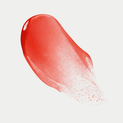 Red lip gloss swatch on a light gray background