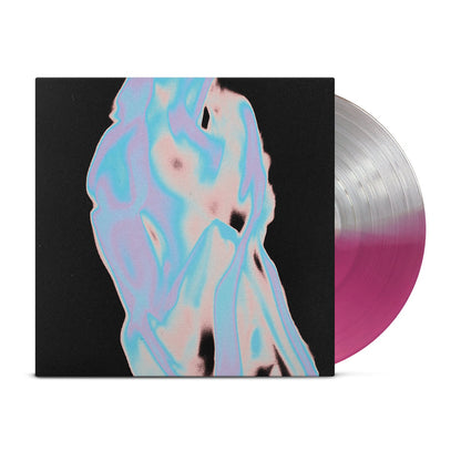 A Silverline half clear violet and silver vinyl record by Anberlin is partially out of a black album cover featuring an abstract, pastel-toned human figure.