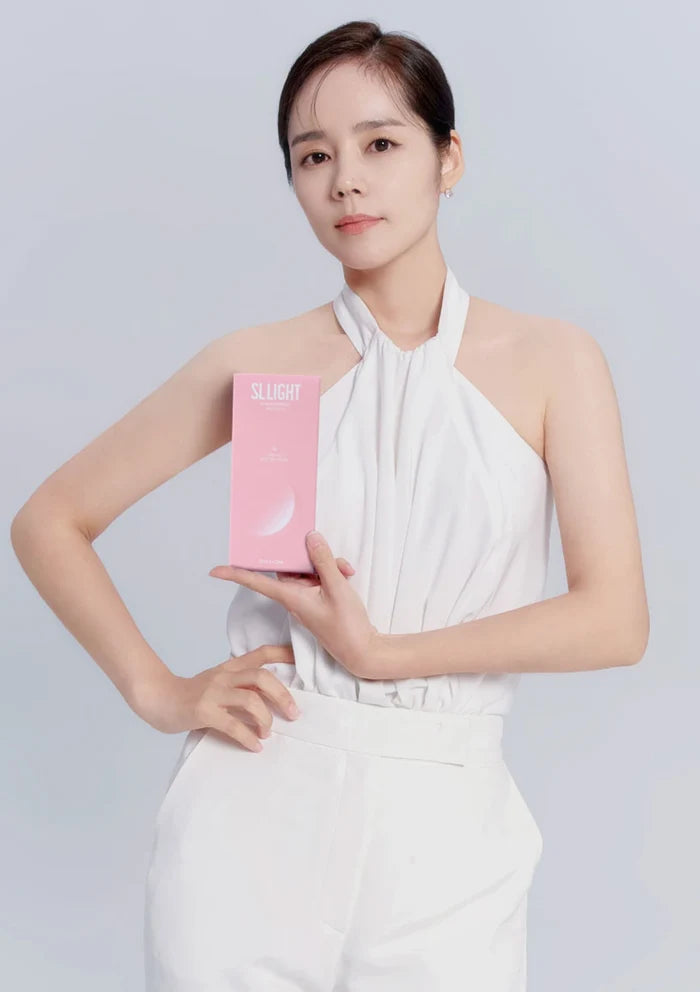 Woman holding a pink box with a white background