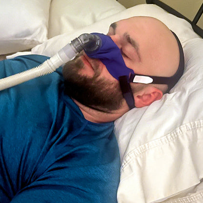 Man Wearing Sleepweaver 3D Mask while in bed
