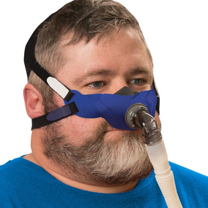 Man with a beard wearing a SLeepweaver Elan CPAP Mask