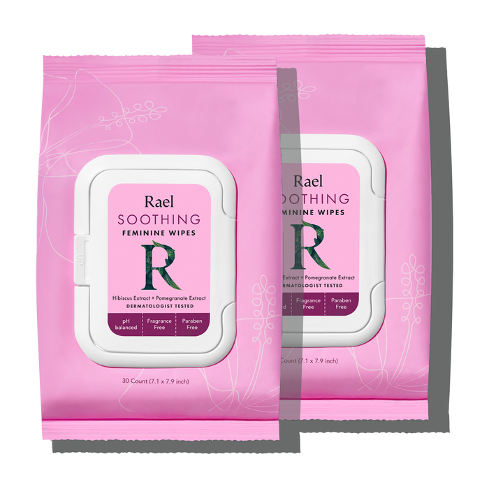 Two pink packages of Rael Soothing Feminine Wipes with resealable caps, featuring product information and branding.