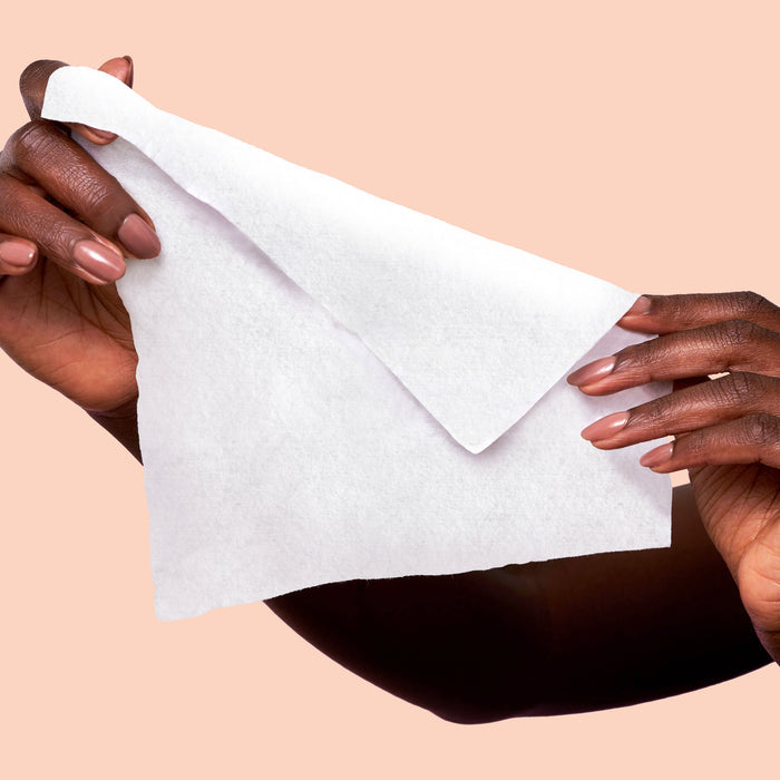 Rael Soothing Feminine Wipe being held in model's hands