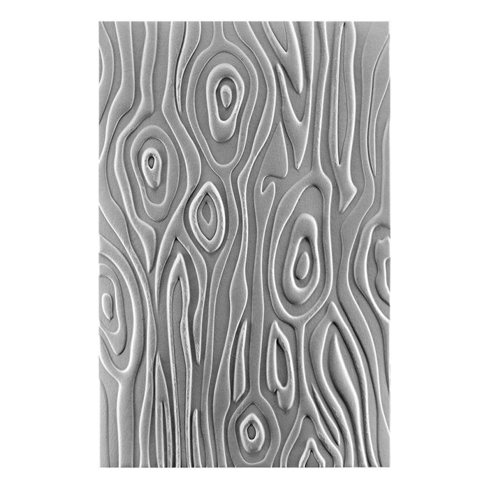 Spellbinders - 3D Embossing Folder - Knock On Wood. This has an intense wood grain designs. Texturize a surface of various card sizes from A2 to a Slimline. For detailed impression, lightly mist the cardstock on both sides with water before embossing. Available at Embellish Away located in Bowmanville Ontario Canada