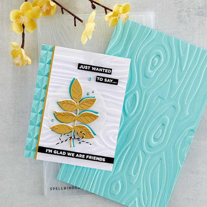 Spellbinders - 3D Embossing Folder - Knock On Wood. This has an intense wood grain designs. Texturize a surface of various card sizes from A2 to a Slimline. For detailed impression, lightly mist the cardstock on both sides with water before embossing. Available at Embellish Away located in Bowmanville Ontario Canada Card example by brand ambassador.