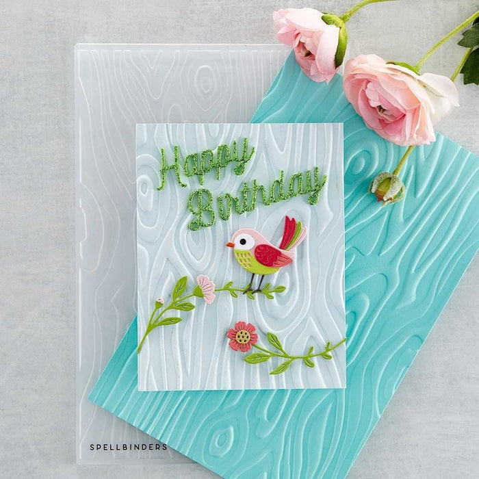 Spellbinders - 3D Embossing Folder - Knock On Wood. This has an intense wood grain designs. Texturize a surface of various card sizes from A2 to a Slimline. For detailed impression, lightly mist the cardstock on both sides with water before embossing. Available at Embellish Away located in Bowmanville Ontario Canada Card example by brand ambassador.